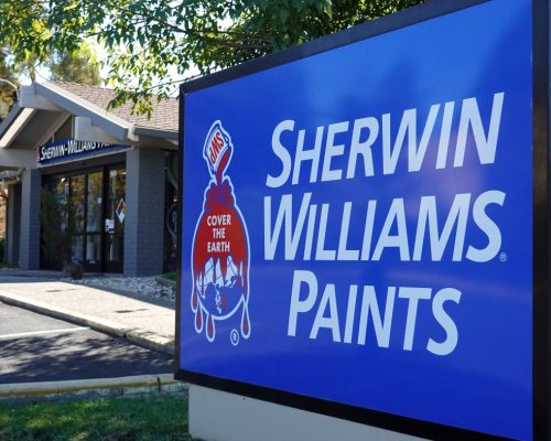 Sherwin-Williams Paints sign in front of a company building in the United States