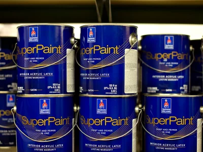Multiple Sherwin-Williams paint cans displayed, top-quality paint products from the U.S.